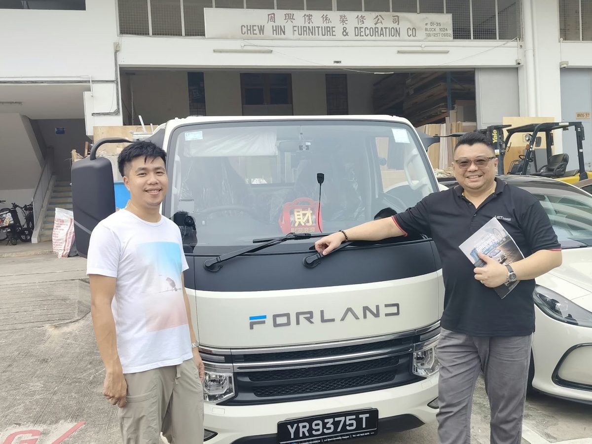 Forland truck handover outside a client workshop